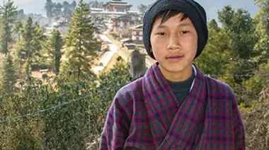 Karma et les oiseaux sacrés du Bhoutan