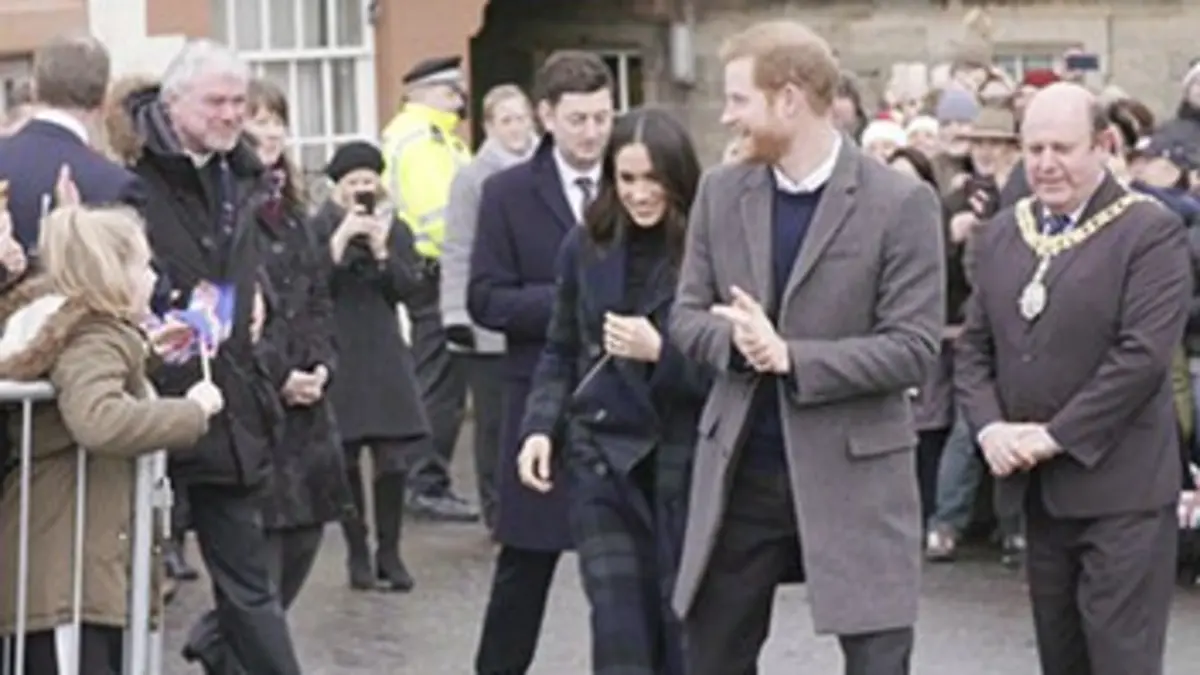 Grands reportages Meghan & Harry : un conte de fée à Buckingham