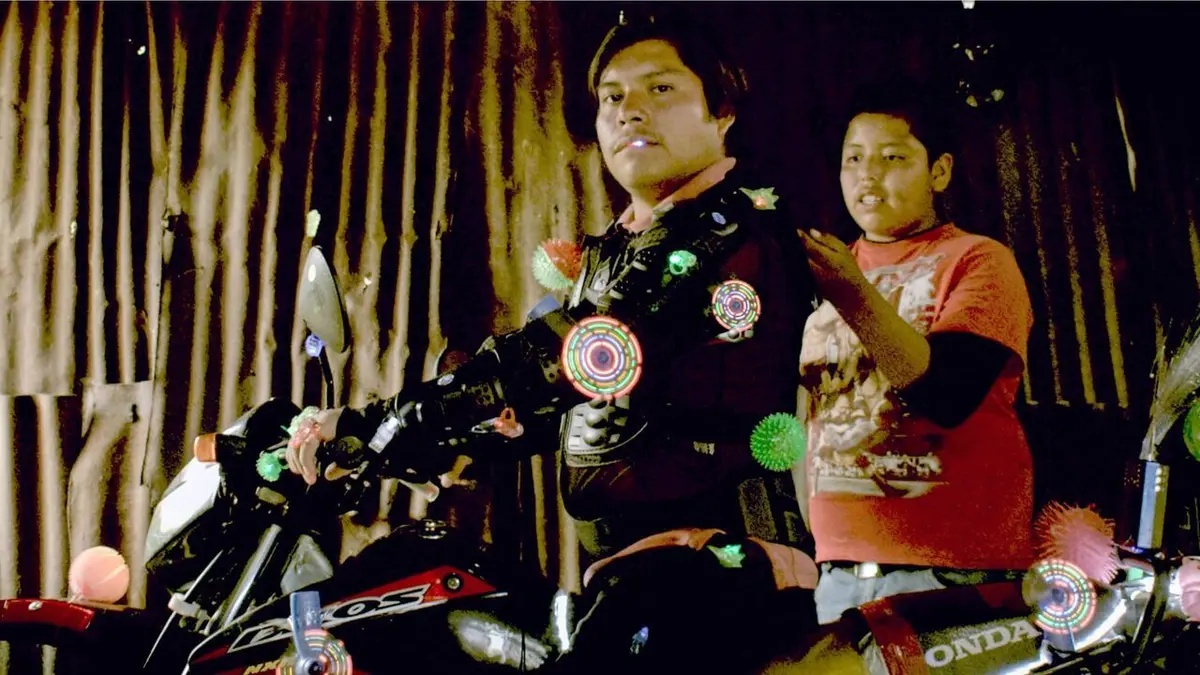 Motorcyclist's Happiness Won't Fit Into His Suit