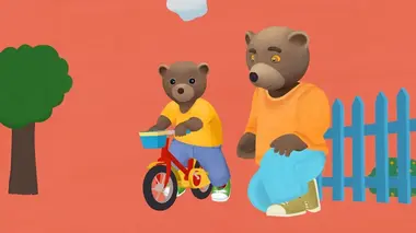 Petit Ours Brun à vélo