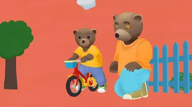Petit Ours Brun à vélo