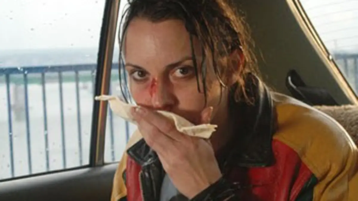 The Woman with the Broken Nose