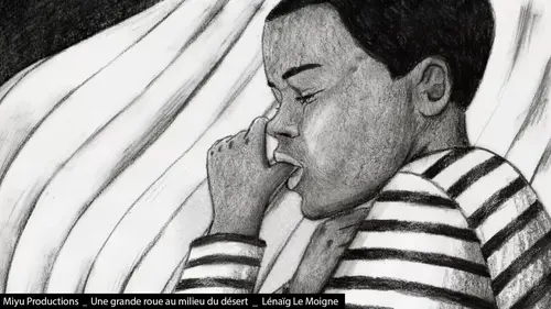 Une grande roue au milieu du désert