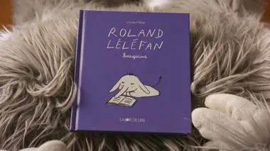 Roland Léléfan bouquine